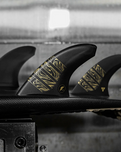 The Futures Fins Alpha Vector 3/2 Medium Fins in Carbon & Gold