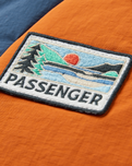 The Passenger Womens Ocean 2.0 Insulated Jacket in Dark Denim & Sunset Orange