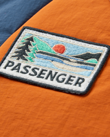 The Passenger Womens Ocean 2.0 Insulated Jacket in Dark Denim & Sunset Orange