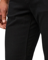 The Duer Ltd Mens Performance Denim Relaxed Taper Jeans in Black