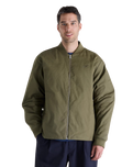 The New Balance Mens NB Numeric Thermal Jacket in Olive