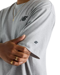 The New Balance Mens Numeric Small Logo T-Shirt in Athletic Grey