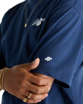 The New Balance Mens Numeric Small Logo T-Shirt in Navy