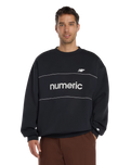 The New Balance Mens Numeric Team Sweatshirt in Black
