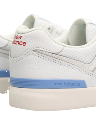 Numeric 574 Vulcanized Shoes in White & Baby Blue