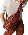 We The Free Soho Convertible Sling Bag in Distressed Brown
