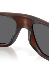 The Oakley Neoforma Polarized Sunglasses in Prizm Black & Matte Rootbeer