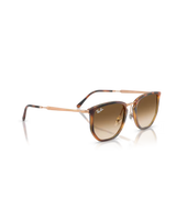 The Ray-Ban RB4451 Sunglasses in Polished Transparent Orange