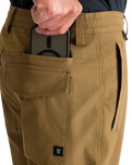The Roark Mens Layover Pro Traveler Trousers in Dark Khaki