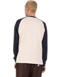 The Santa Cruz Mens Classic Strip Raglan Long Sleeve T-Shirt in Wax Paper & Midnight Blue