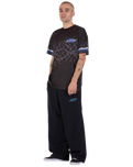 The Santa Cruz Mens Pinstripe Wide Leg Joggers in Black