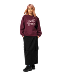 The Santa Cruz Womens Ribbon Script Front Sweatshirt in Dark Cherry