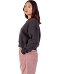 The Santa Cruz Womens Star Snail Sweatshirt in Black Wash