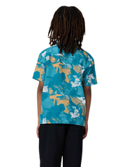 The Santa Cruz Boys Boys Stamped Opus Shirt in Teal Woodcut Camo