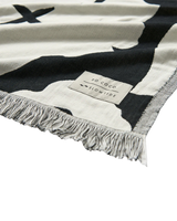The Slowtide XOXO Driftweave Coco Ho x Slowtide Beach Blanket in Black