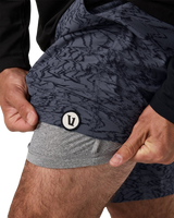 The Vuori Mens Kore Volley Shorts in Moonlight Sand