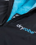 The Dryrobe Advance Long Sleeved in Black & Blue
