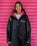The Dryrobe Kids Advance Long Sleeved Dryrobe in Black & Pink