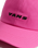 Check Side Curved Bill Jockey Cap in Pink Fizz