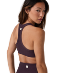 The Vuori Womens Elevation Racer Bra in Raisin Heather